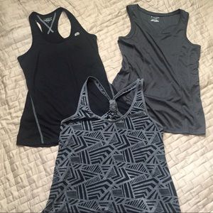 Three ladies workout tank top lot. Sizes S & M